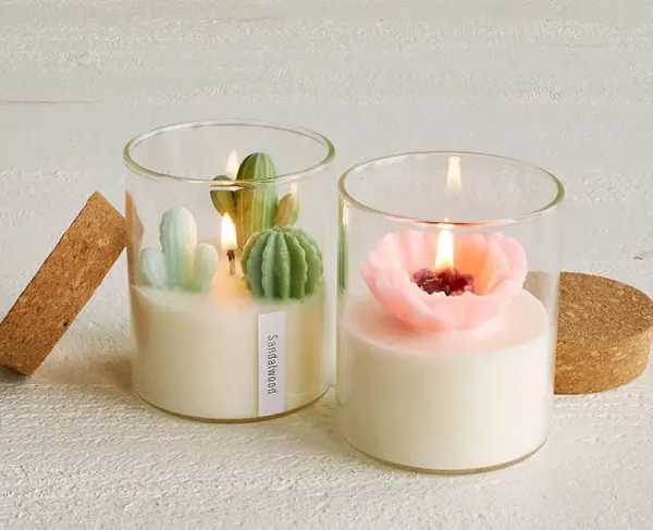 Velas artesanales con suculentas y flores